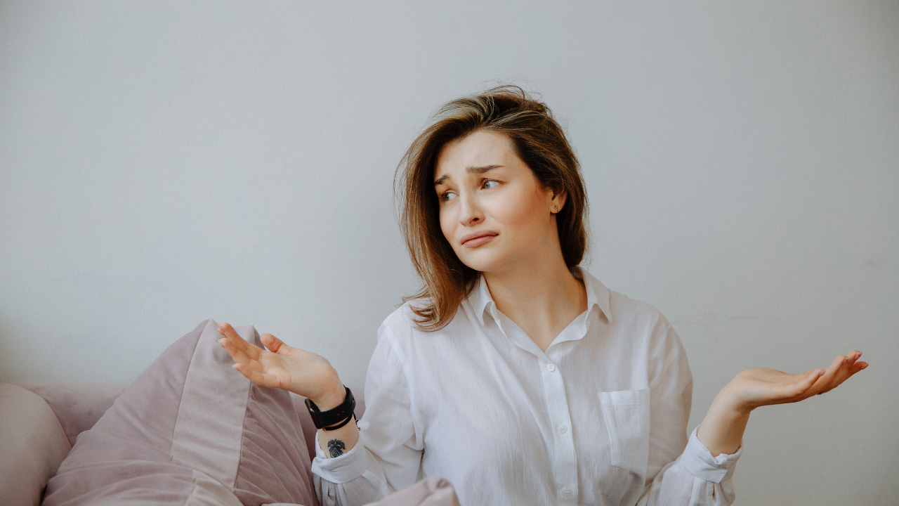 Image of woman shrugging